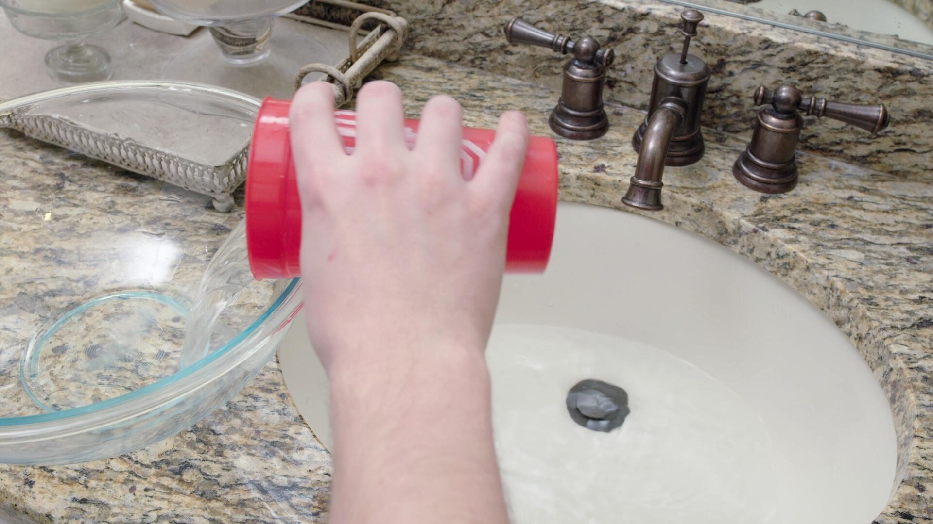 water in bathroom sink not draining